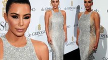 Kim Kardashian cuts glamorous figure in sheer panelled silver dress at Cannes but opts for VERY dr.