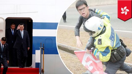 Student protesters pinned to the ground by Hong Hong cops during Chinese top official's visit