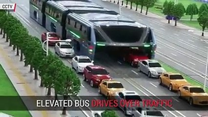 elevated chineese bus that drives over traffic