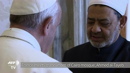Pope and top imam embrace in historic meeting at Vatican