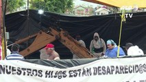 México: Exhuman cuerpos en fosa común cavada por autoridades