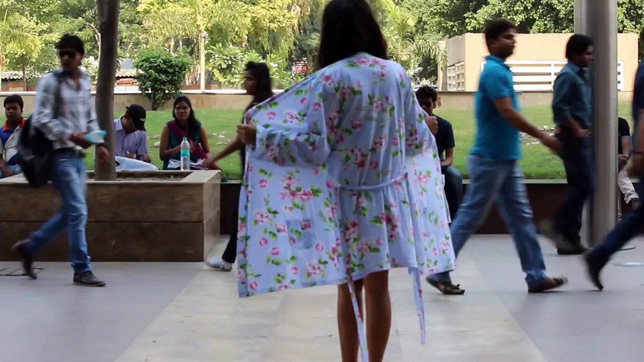 Indian girl goes topless on street_ Shocking Video!