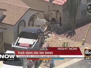 Driver crashes into two houses in Chandler