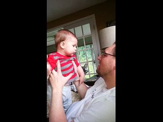 Baby boy laughs at dad and pukes