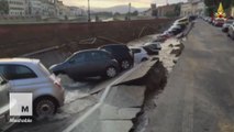 200-meter sinkhole swallows dozens of cars along riverbank in Italy