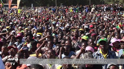 Mugabe tells cheering supporters 'My people want me to stay'