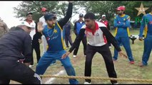 Pakistan cricketers beat Army trainers at tug of war
