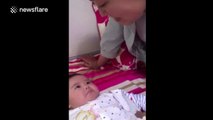 Five-month-old baby imitates mum's expressions