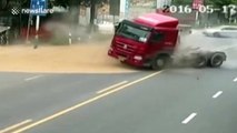 Motorbike driver escapes being buried by sand pouring out of trailer