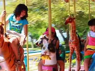 Children Playing in Park on SeeSaw, Slides