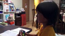 A 9 year old boy solves a Rubik's cube!