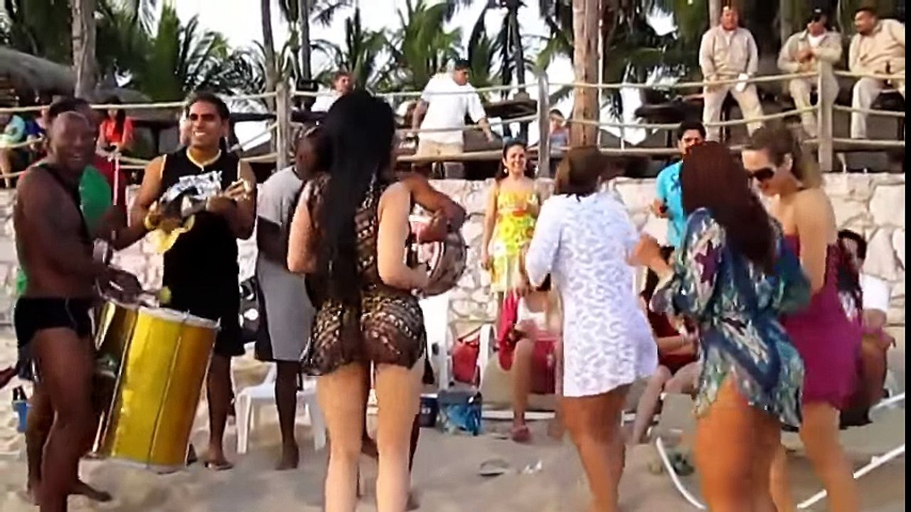 Hot Brazilian girl dancing sexy samba on the beach HD