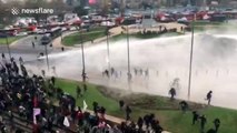 Violent riots between students and police in Chile