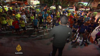 Venezuelans escape daily pressures by running