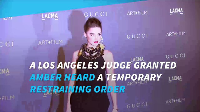 Amber Heard granted restraining order against Johnny Depp