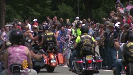 US Presidential candidates hit the campaign trail over holiday weekend