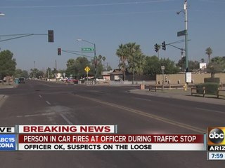 Person in car fires at officer during traffic stop