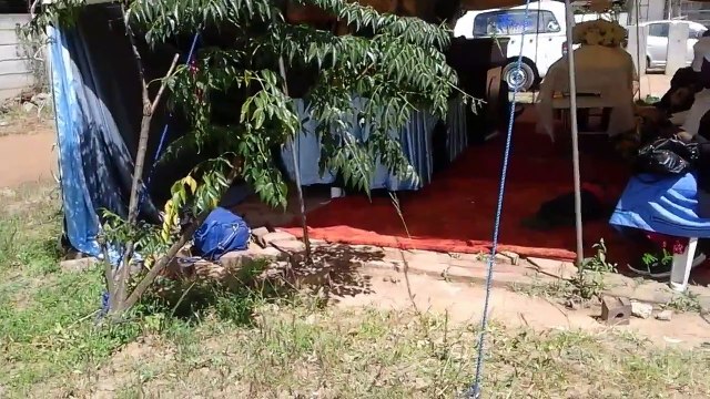 Reformed Church in Zimbabwe's Reverend Mutuvira at Chardcombe Church service for the late JVN Makuve