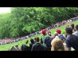 Hundreds Watch as Cheese-Rolling Runners Hurl Themselves Down Hill