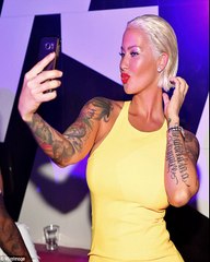Amber Rose packs PDA toyboy Terrence Ross reveals new platinum blonde undercut bob