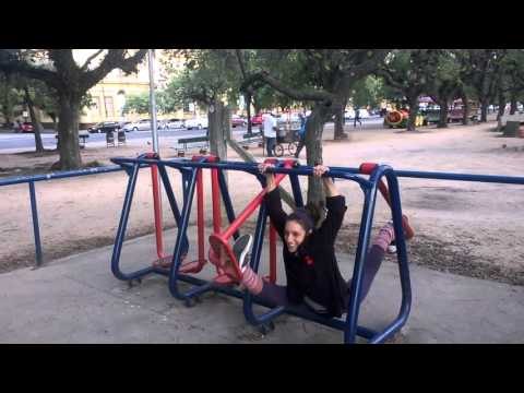 Circus Performer Shows Off Flexibility on Street Gym Machine
