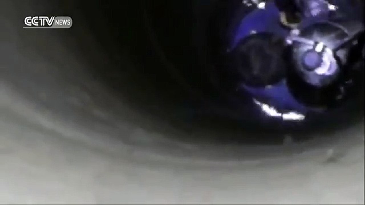 Firefighter hangs upside down to save kid trapped in well