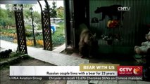 Russian couple lives with a bear for over 20 years.