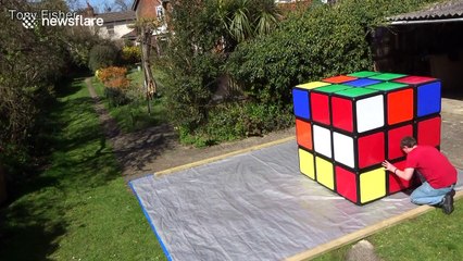 Man solves world's largest Rubik's Cube