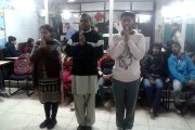 AGWO : A Giggles Welfare Organization : Mentally disabled children performing Morning assembly prayer .