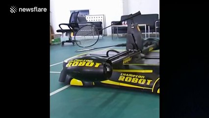 Robot plays badminton with student in China