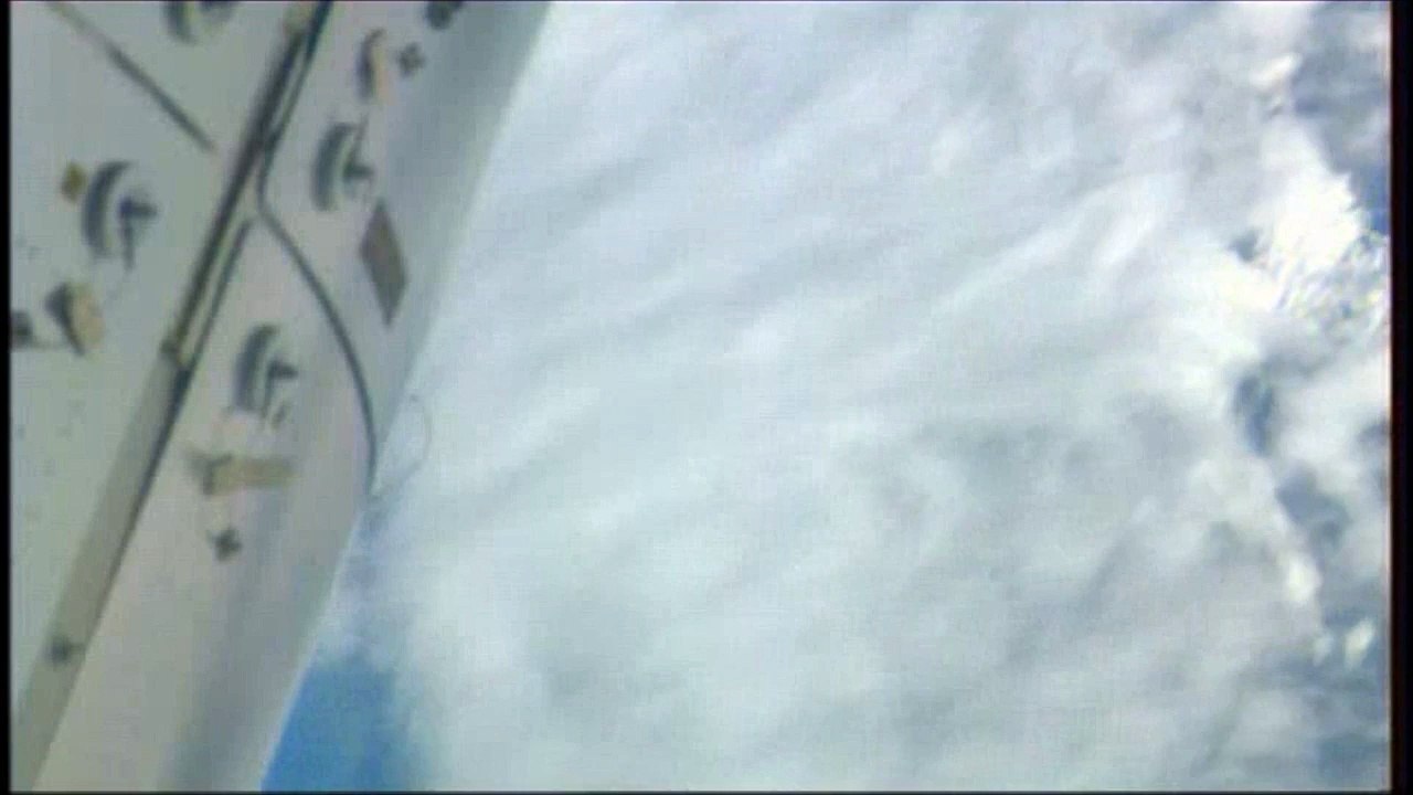 UFO comes out of the clouds ISS 2013 11 27  22 h35m32s NASA ISS