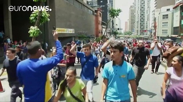 Venezuelans protest as the country suffers hyperinflation, power cuts, and food shortages