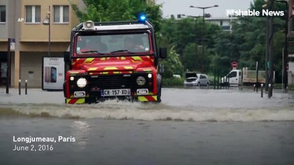 The flooding in Paris is so severe, people are swimming down streets