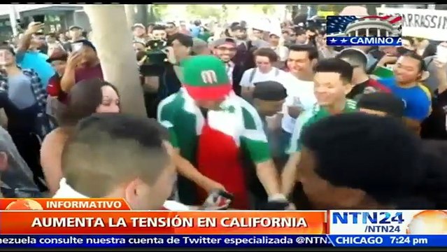 Simpatizantes y opositores al precandidato republicano Donald Trump se enfrentan en la localidad de San José