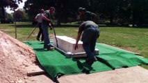 Lowering the Casket into the Ground
