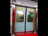 (29-04-2010)  A Ghost Door in MTR East Rail Line MLR Train