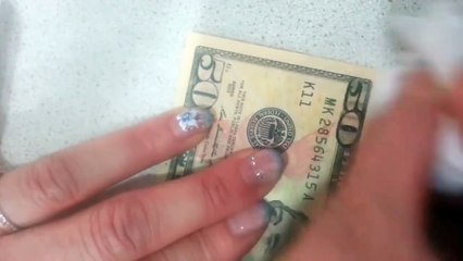 Un faux billet de 50$ sur un billet de 10$... Rentable haha !