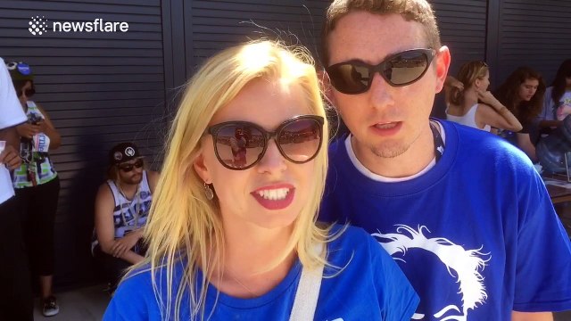 Happy couple interviewed at Bernie Sanders rally