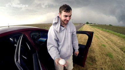 Storm chasers track large hail storm and tornadoes in Kansas