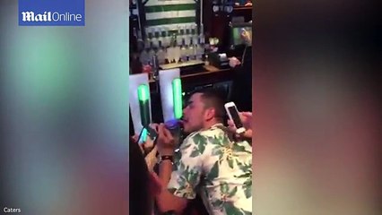Bêbado fica com língua presa em bomba congelada de cerveja dentro de bar