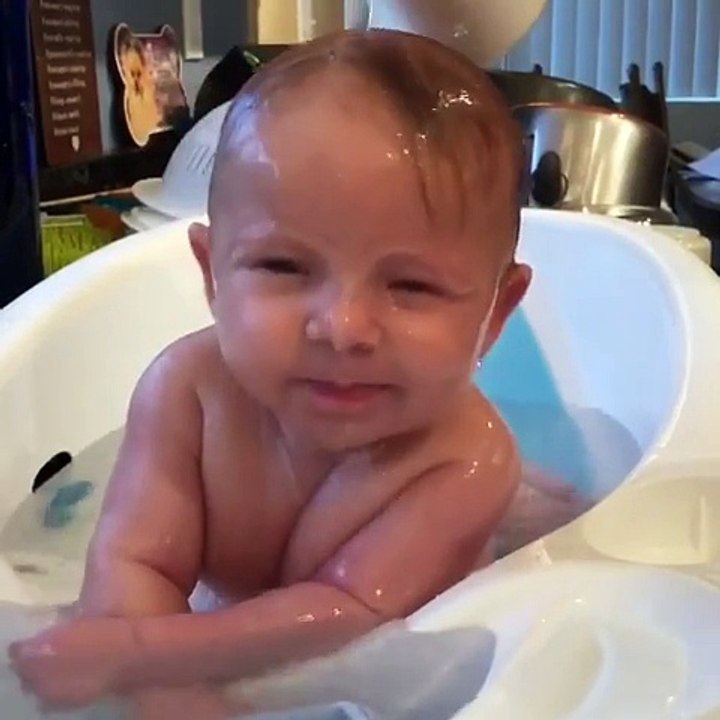 Adorable Baby Enjoys Bathtime