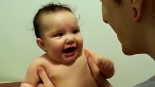 Funny Baby Face - Father scares baby