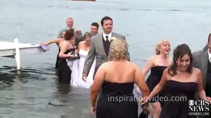 Bride and Groom fall in a lake at their wedding party