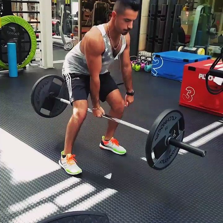 Weight training with trainer Rami Beaini