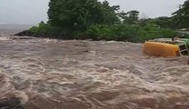 Bus Attempts To Cross Ragin a Flood