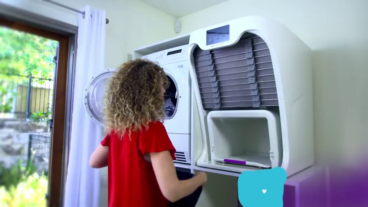 Une machine qui repasse et plie le linge... Révolutionnaire