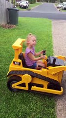 Little Girl Helps Dad Out Using Her Mini Bulldozer
