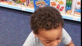 Christopher playing at Toys R' Us
