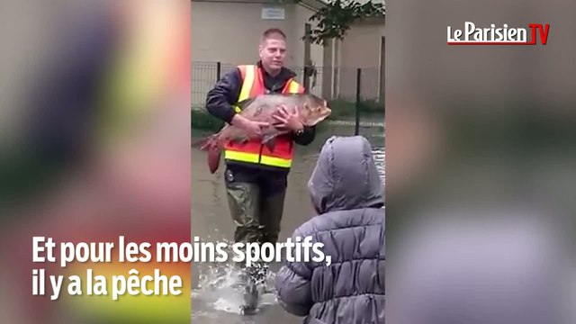 Inondations : Jet ski, natation et voyage en pelleteuse