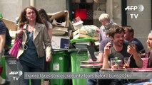 Rubbish piles up in Paris as labour strikes continue